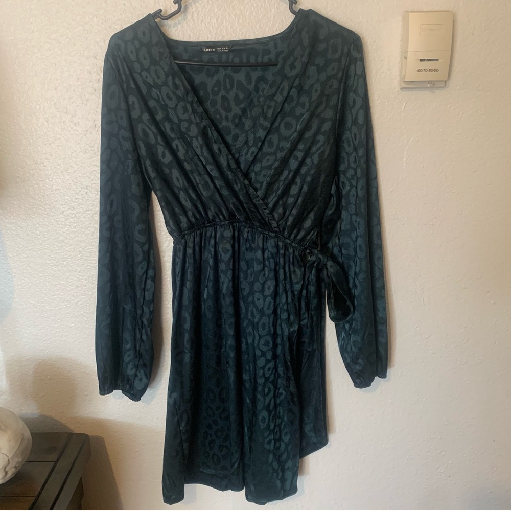 Like new - deep green silky v-neck animal print dress size small